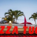 Pizza Tugos sign in West OC