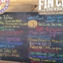 a list of beers on tap at Pizza Tugos in Ocean City, MD