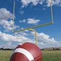 football in front of goal posts