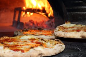pizzas and wood oven