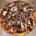 Cheeseburger pizza in the box